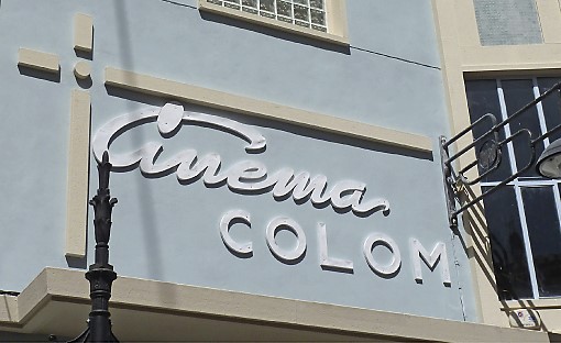 Storefront sign: Cinema Colón